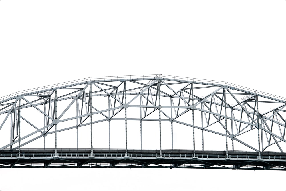 Connect Collection. A Bridge in the Sky. A photograph by Jeff Kauffman showing the ironwork structure of the original Harbor Bridge in Corpus Christi, Texas USA ©Jeff Kauffman