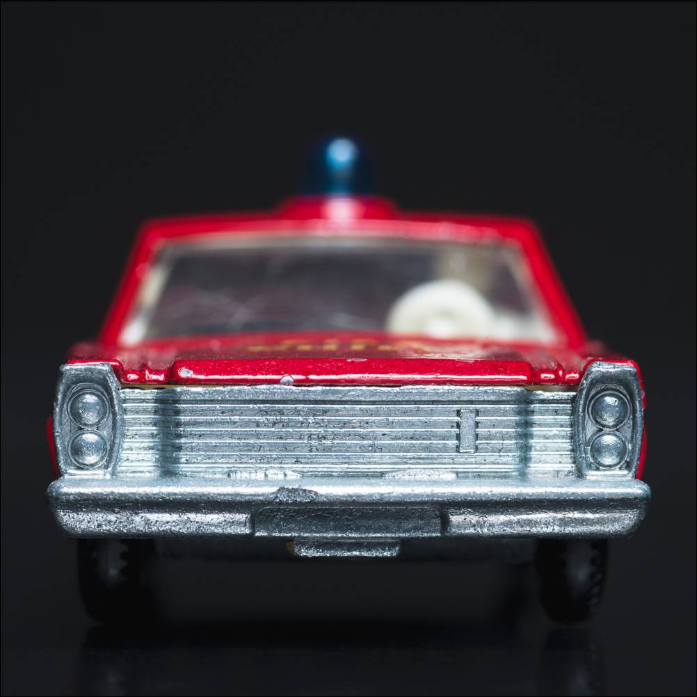 From the Carface collection. Ford Galaxy Red Fire Chief, Matchbox Series No. 55/59. A color photograph by Jeff Kauffman of a vintage matchbox car. ©Jeff Kauffman