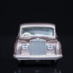 From the Carface collection. Rolls Royce Phantom V, Matchbox Series No. 44. A color photograph by Jeff Kauffman of a vintage matchbox car. ©Jeff Kauffman