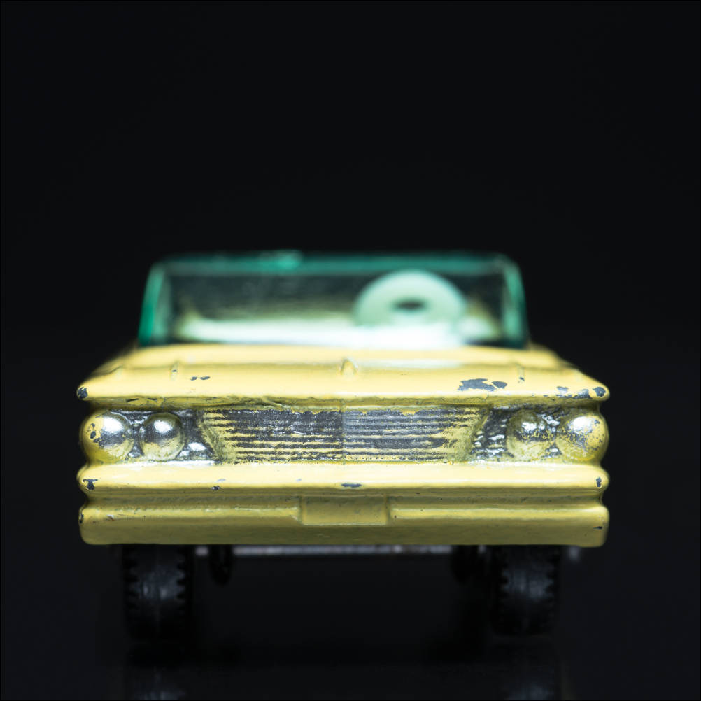 From the Carface collection. Pontiac Convertible, Matchbox Series No. 39. A color photograph by Jeff Kauffman of a vintage matchbox car. ©Jeff Kauffman