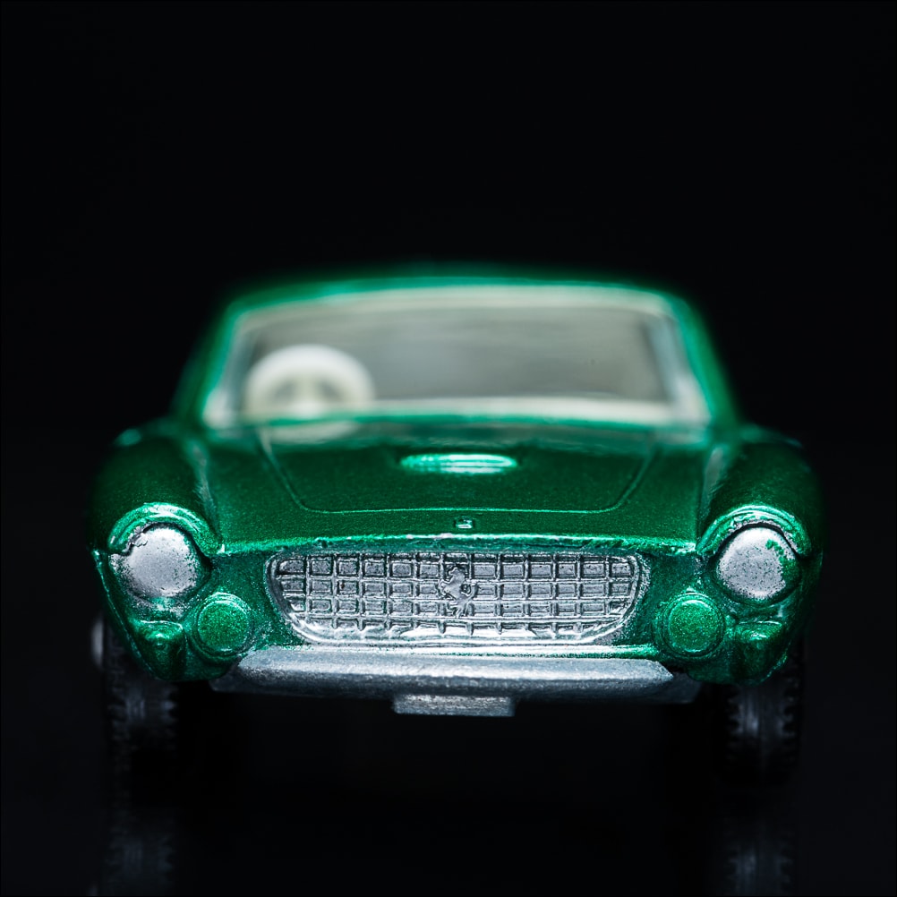 From the Carface collection. Ferarri Berlinetta, Matchbox Series No. 75. A color photograph by Jeff Kauffman of a vintage matchbox car. ©Jeff Kauffman
