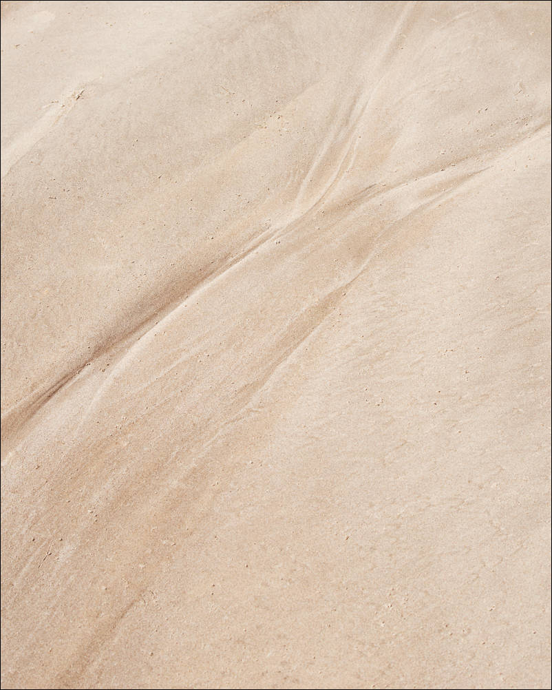 Water Marks Collection. Water Marks 0011. A photograph by Jeff Kauffman showing abstract forms made by water flowing over sand. These natural patterns are sometimes subtle, sometimes rough, always interesting. ©Jeff Kauffman