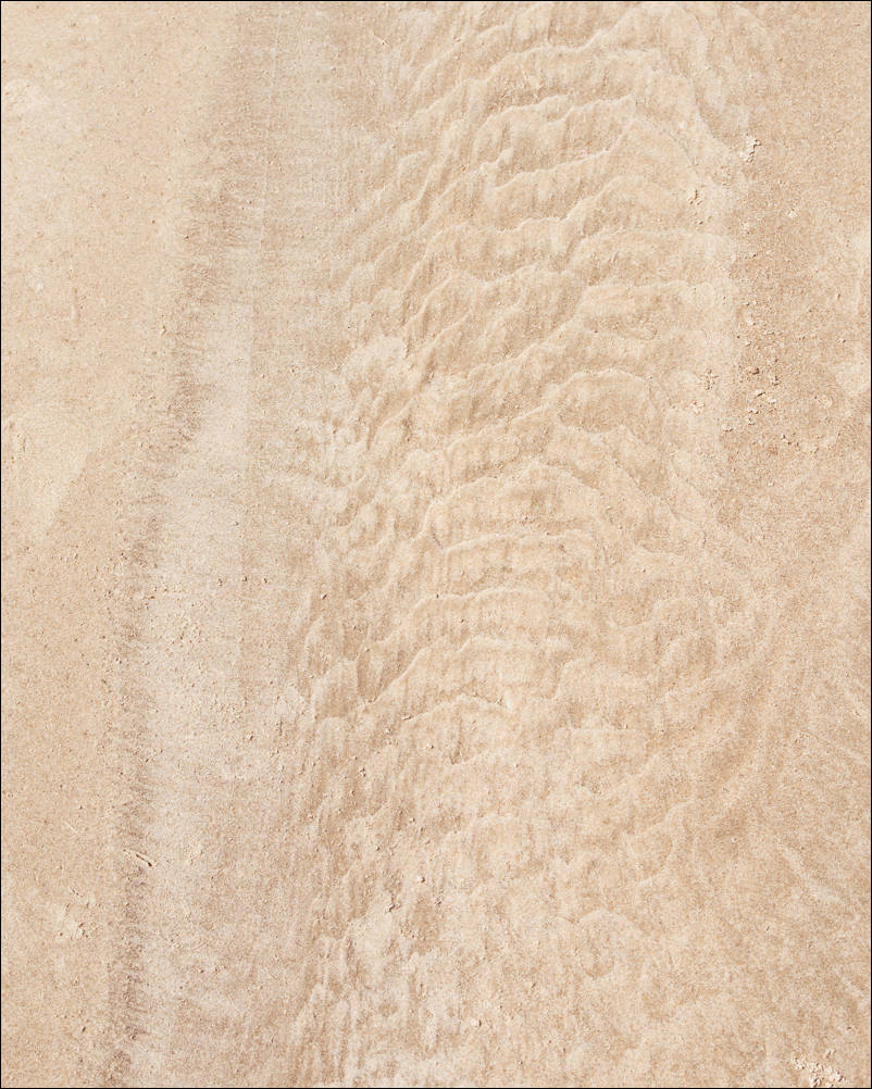 Water Marks Collection. Water Marks 0043. A photograph by Jeff Kauffman showing abstract forms made by water flowing over sand. These natural patterns are sometimes subtle, sometimes rough, always interesting. ©Jeff Kauffman