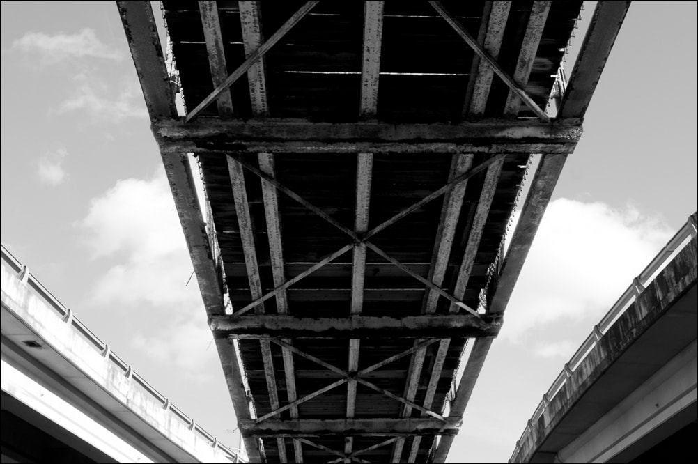 Connect Collection. Highway Bridges Connect and Merge. A black and white photograph by Jeff Kauffman showing highway bridges merging on Mopac Expressway in Austin TX USA. ©Jeff Kauffman