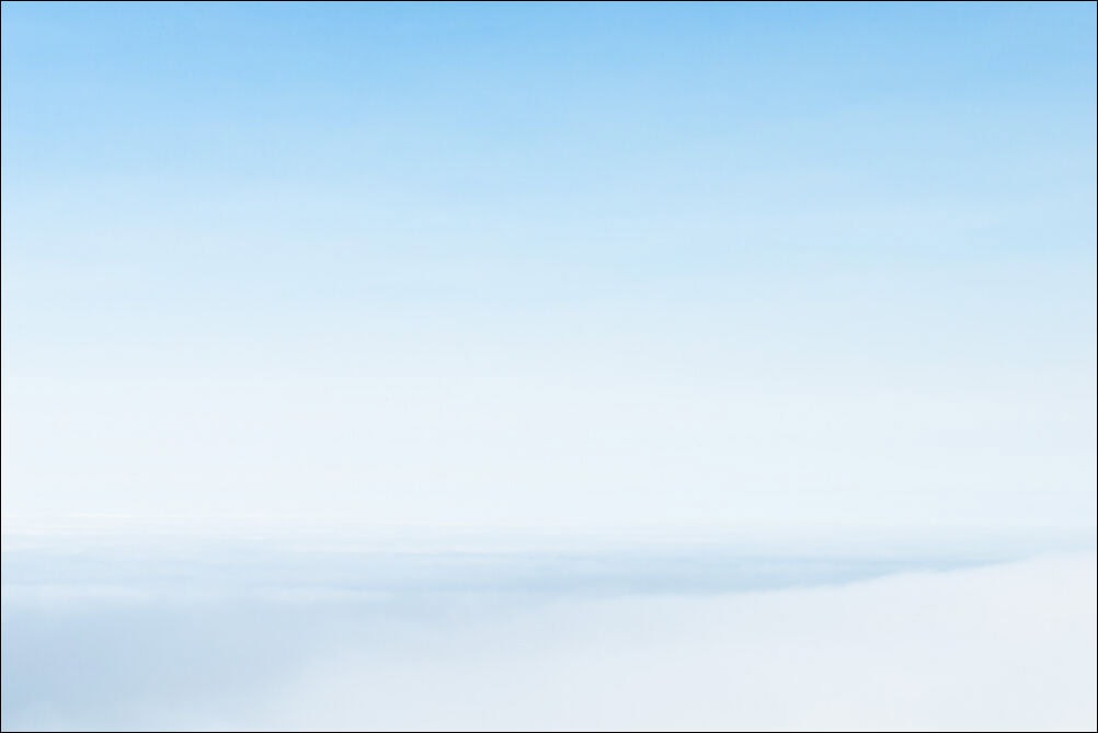 Expansive Sky #0906. Soft heavenly white clouds against a blue sky. Photograph by photographer Jeff Kauffman of Austin, Texas USA. ©Jeff Kauffman