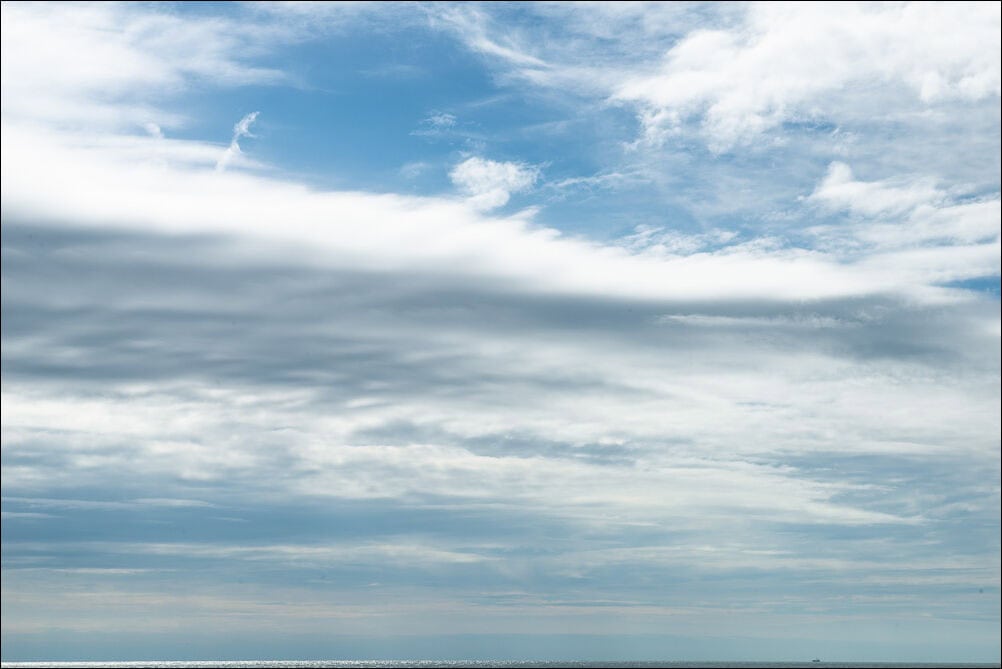 Expansive Sky #0098. Dramatic white clouds against a blue sky. Photograph by photographer Jeff Kauffman of Austin, Texas USA. ©Jeff Kauffman